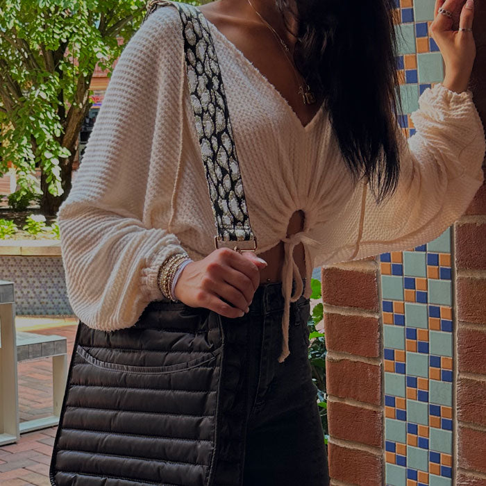 Woman Wearing the Everly Quilted Nylon Bag.  