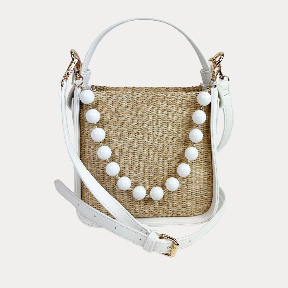 Carly Raffia Bag White. Vegan Leather Handle and Sides, Bead Trim, and Adjustable Vegan Leather Bag Strap