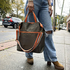 woman holding Army Nicole Tote by the handles