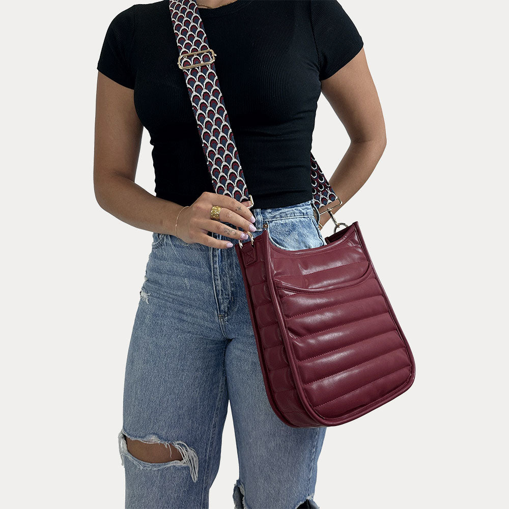 women wearing the Sarah Quilted Vegan Leather Messenger in Brick with a Geometric Patterned Bag Strap